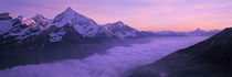 Switzerland, Swiss Alps, Aerial view of clouds over mountains by Panoramic Images