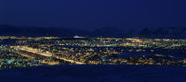 High angle view of city lit up at night, Reykjavik, Iceland von Panoramic Images