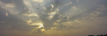 Low angle view of sun shinning behind cloud, Luxembourg City, Luxembourg by Panoramic Images