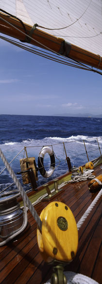 Detail of the mainsheet block of a wooden sailboat in the sea by Panoramic Images