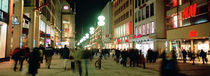 Buildings in a city lit up at night, Munich, Germany von Panoramic Images