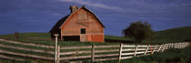 Old barn with a fence in a field, Palouse, Whitman County, Washington State, USA by Panoramic Images