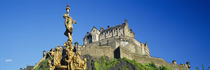 Low angle view of a castle on a hill, Edinburgh Castle, Edinburgh, Scotland by Panoramic Images