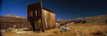 Abandoned buildings on a landscape, Bodie Ghost Town, California, USA von Panoramic Images
