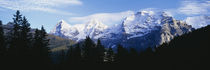 Snow covered mountains on a landscape, Bernese Oberland, Switzerland by Panoramic Images