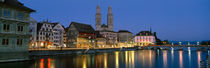 Buildings at the waterfront, Grossmunster Cathedral, Zurich, Switzerland by Panoramic Images