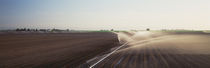 USA, California, Central Valley, Irrigation in the field by Panoramic Images