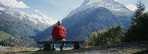 Hiker Contemplating Mountains Switzerland von Panoramic Images