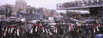 Bicycles parked in a parking lot, Amsterdam, Netherlands von Panoramic Images