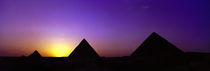Silhouette of pyramids at dusk, Giza, Egypt by Panoramic Images