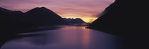 Sunset over a lake, Sylvenstein Lake, Bavarian Alps, Germany by Panoramic Images