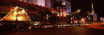 Buildings in a city lit up at night, The Strip, Las Vegas, Nevada, USA von Panoramic Images