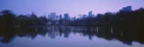 USA, New York State, New York City, Central Park Lake, Skyscrapers in a city by Panoramic Images
