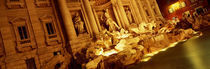 Fountain lit up at night, Trevi Fountain, Rome, Italy von Panoramic Images
