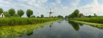 Traditional windmill along with a canal, Damme, Belgium by Panoramic Images