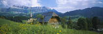 Chalet and a church on a landscape, Emmental, Switzerland by Panoramic Images