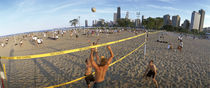 Four people playing beach volleyball, North Avenue Beach, Chicago, Illinois, USA by Panoramic Images