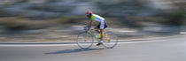 Bike racer participating in a bicycle race, Sitges, Barcelona, Catalonia, Spain von Panoramic Images