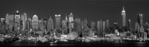 New York City, Panoramic view of the West side skyline at night by Panoramic Images