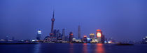 Buildings at the waterfront lit up at dusk, Pudong, Shanghai, China by Panoramic Images