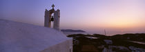 Bell tower on a building, Ios, Cyclades Islands, Greece by Panoramic Images