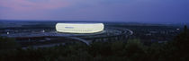 Soccer stadium lit up at nigh, Allianz Arena, Munich, Bavaria, Germany by Panoramic Images