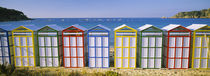 Beach huts in a row on the beach, Catalonia, Spain by Panoramic Images