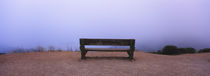 Empty bench in a parking lot, California, USA von Panoramic Images