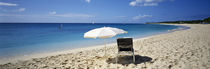 Single Beach Chair And Umbrella On Sand, Saint Martin, French West Indies by Panoramic Images