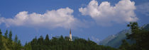 Trees in front of a church, Stams, Austria by Panoramic Images
