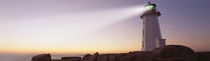 Low Angle View Of A Lighthouse at dusk, Peggy's Cove, Nova Scotia, Canada by Panoramic Images