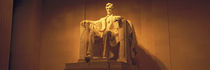 Lincoln Memorial, Low angle view of the statue of Abraham Lincoln by Panoramic Images