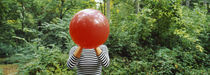 Woman blowing a balloon, Germany von Panoramic Images
