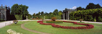 Formal garden in front of a building, Schonbrunn Gardens, Vienna, Austria by Panoramic Images