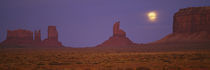 Moon shining over rock formations, Monument Valley Tribal Park, Arizona, USA by Panoramic Images