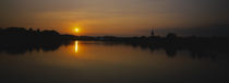 Sunset over a lake, See Park, Freiburg, Germany by Panoramic Images