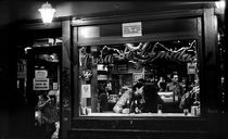 Lovers kiss in a cafe. Madrid, 2011 by Maria Luros