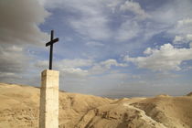 Judean Desert, a cross on the road to the Greek Orthodox St. George Monastery by Hanan Isachar