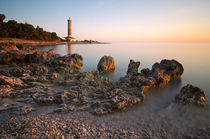 Sunset by the lighthouse by Ivan Coric