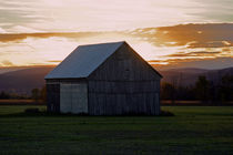 Old barn in the sunset by Angel Vallée