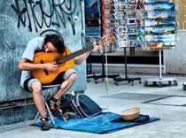 Street guitarist by Ivan Aleksic