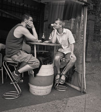 Men with beers: Berlin by Ron Greer