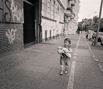 Young girl with baby: Berlin by Ron Greer
