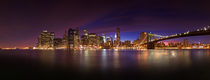 Lower Manhattan Skyline at Night from Brooklyn Bridge Park in New York (USA).. by Zoltan Duray
