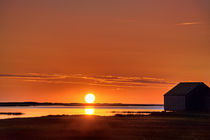 Sunrise over salt pond, Cape Cod, USA by John Greim