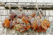 Bait bags hang from a dockside shed, Bass Harbor, Maine, USA von John Greim