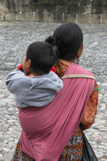 Woman with baby on back in Antigua Guatemala by Charles Harker