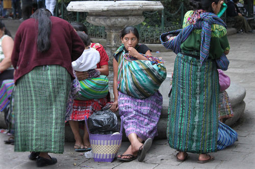 Women-huipil-plaza-antigua-guatemala