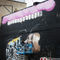 'Two Graffiti Artists decorating a wall.' von Tom Hanslien