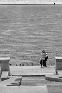 Enamoured couple on quay by cinema4design